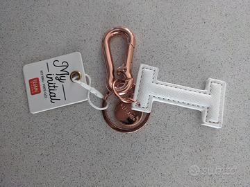 Portachiavi Pochette Iniziale Carpisa Carpisa Abbigliamento