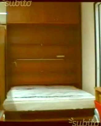 Letto matrimoniale a scomparsa con mobile armadio