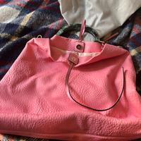 Borsa rosa in pelle con manico in osso
