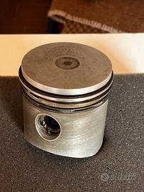 Vecchio pistone fermacarte vintage