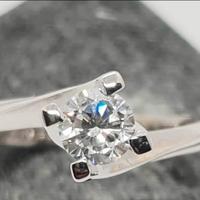 Anello oro18k diamante solitario ct.0.40