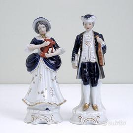 SCULTURE SOPRAMMOBILI COPPIA STILE '700