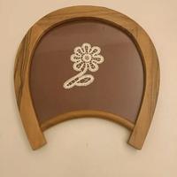 Quadro con fiore in pizzo a Cantù