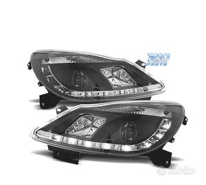 FARI OPEL CORSA D 06-10 LUCE DIURNA FONDO NERO