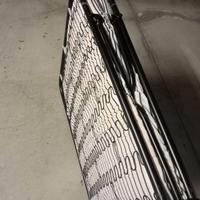 Letto pieghevole portabile con materasso.