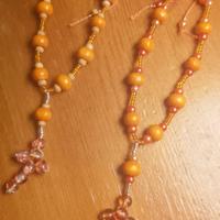 Bracciale perle arancioni con croce, handmade