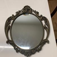 specchio Liberty da parete in metallo.