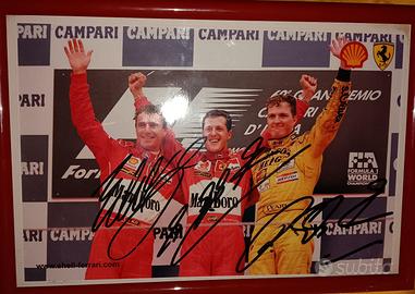autografi originali fratelli Schumacher e Irvine