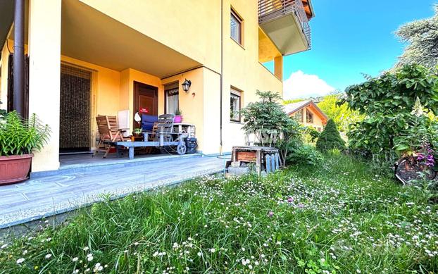 QUADRILOCALE CON GIARDINO E BOX AUTO