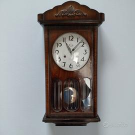 Orologio a pendolo meccanico vintage 