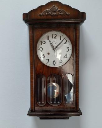 Orologio a pendolo meccanico vintage 