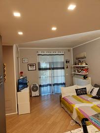 Appartamento con giardino privato e posto auto