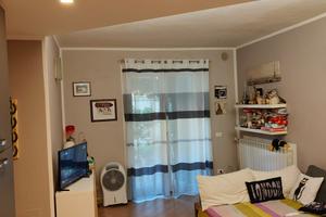 Appartamento con giardino privato e posto auto