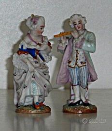 Eleganti vecchie statuine