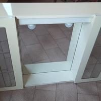 Specchiera laccata bianca.