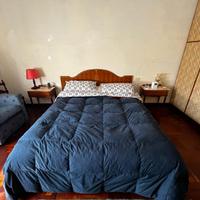 Camera da letto legno e marmo