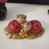 coppia coccinella con fiore thun