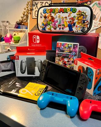 Nintendo Switch + Mario Kart 8 Deluxe e accessori