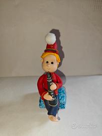 Statuetta artigianale musicista con clarinetto 