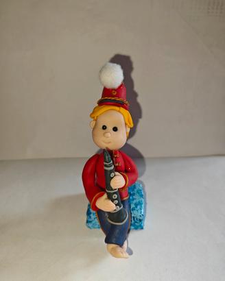 Statuetta artigianale musicista con clarinetto 