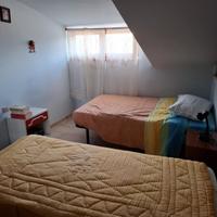 Mansarda con garage e spazio condominiale