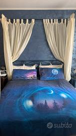 Letto a baldacchino in ferro battuto