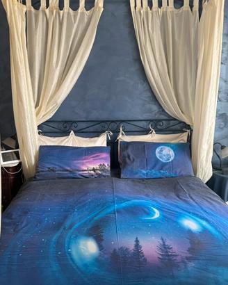 Letto a baldacchino in ferro battuto