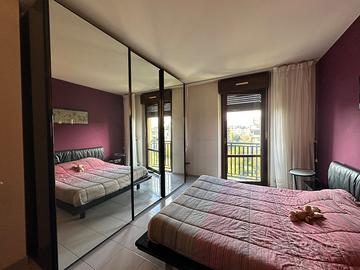 Camera da letto nera lucida