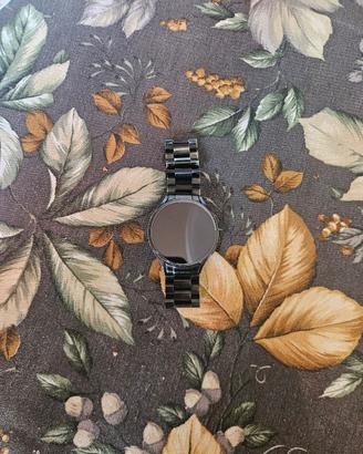 Samsung Galaxy Watch 6 44mm with a few gadgets