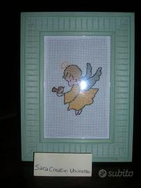 Quadretto con angioletto giallo aranciato