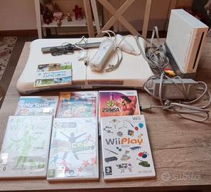 Wii completa di giochi controller e balance board