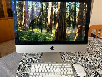 Imac mid 2014 con tastiera, mouse e scatola
