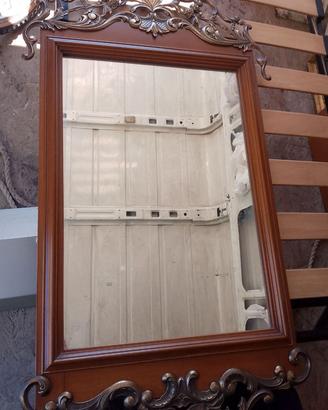 Specchio contornato da ottone