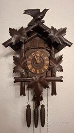 Antico orologio a cucu con quaglia