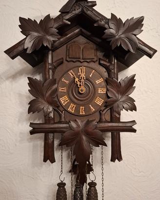 Antico orologio a cucu con quaglia