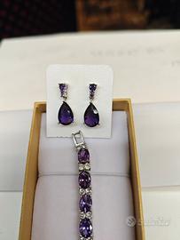 parure in acciaio bracciale e orecchini 