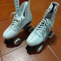 Pattini a rotelle bianchi.. .. nr. 37 ottimi.!