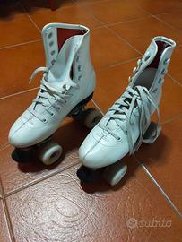 Pattini a rotelle bianchi.. .. nr. 37 ottimi.!