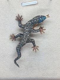 Spilla in oro e diamanti