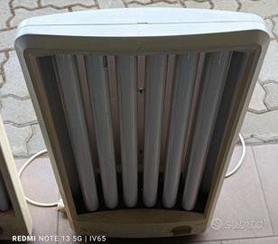 2 lampade abbronzante una facciale e una mezzo bu.