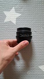 Obiettivo Pentax analogico 50 mm con anello adatta