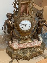 Orologio  candelabri
