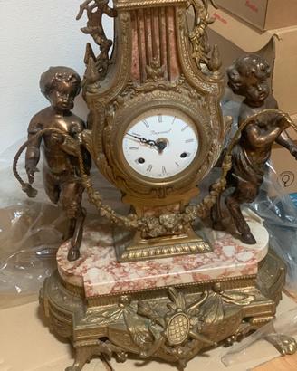 Orologio  candelabri