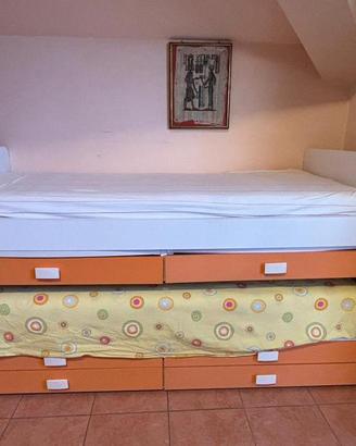 Letto singolo con letto estraibile e cassetti