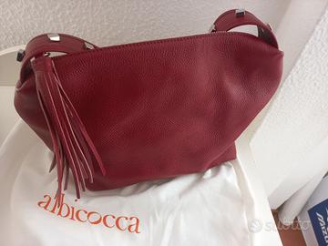 Bora rossa pelle