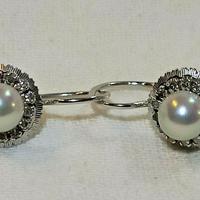 Paio orecchini d'epoca in oro bianco 750 con diama