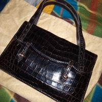 borsa in pelle stampa coccodrillo di colore