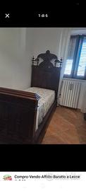 camera con letto singolo antiquariato 