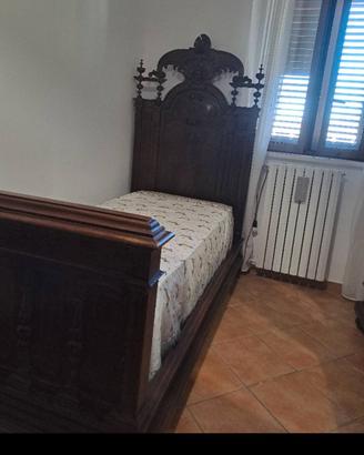 camera con letto singolo antiquariato 