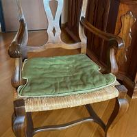 Poltrona in legno con braccioli